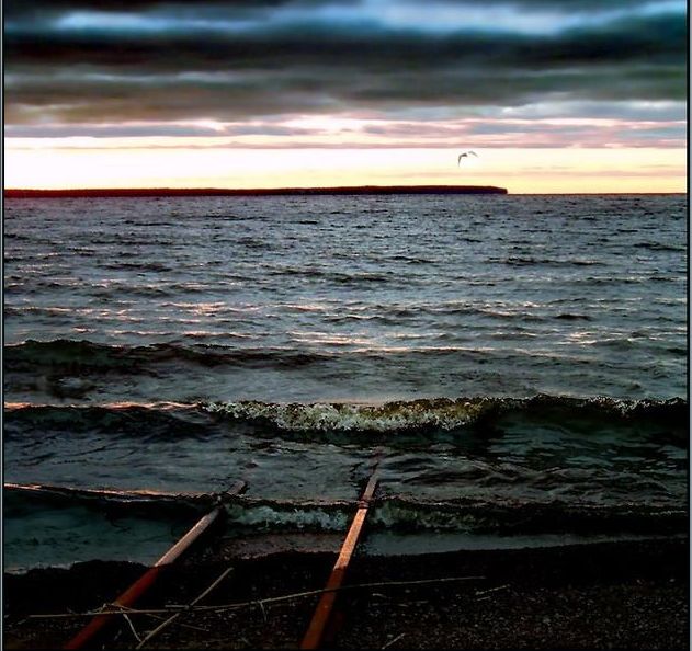 Som - dark clouds over water.jpg